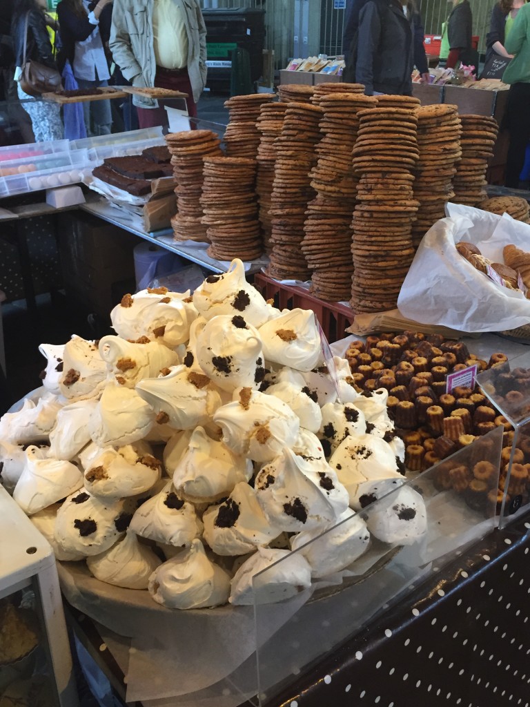 a display of cookies and pastries