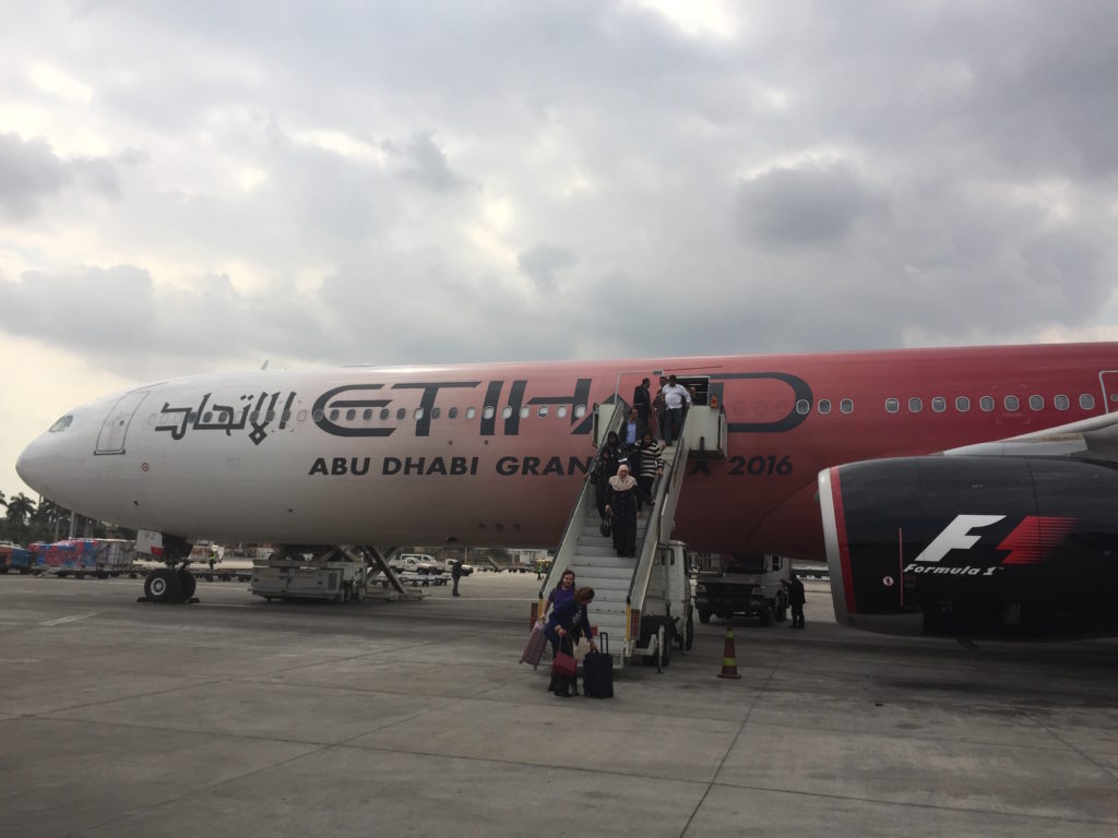 people boarding a plane