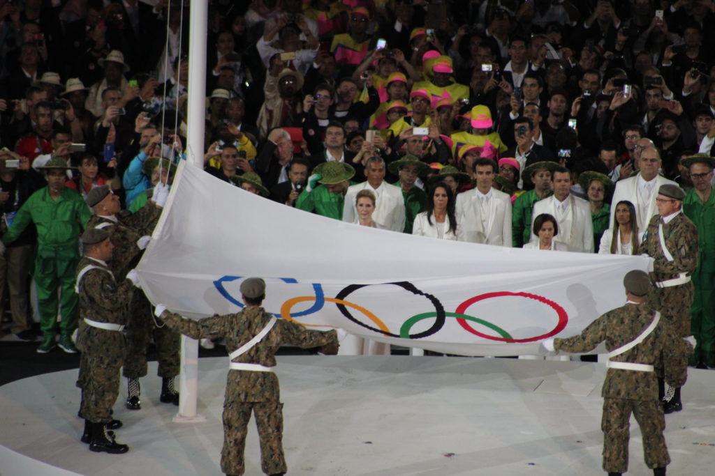 a group of people holding a flag