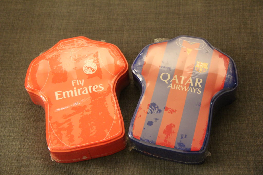Emirates and Qatar cookie tins
