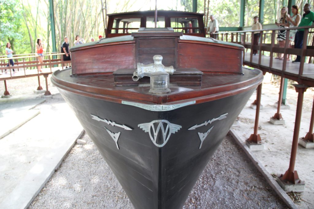 a boat on display in a park