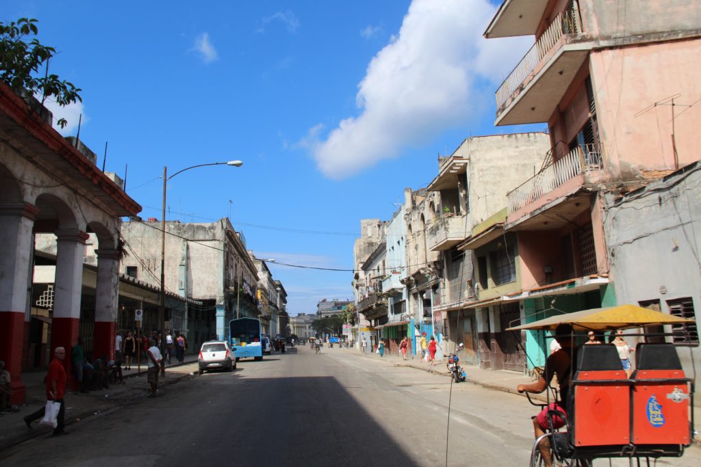 a street with buildings and people on it