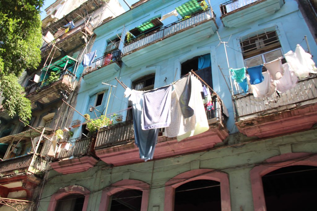 clothes out of a line outside of a building