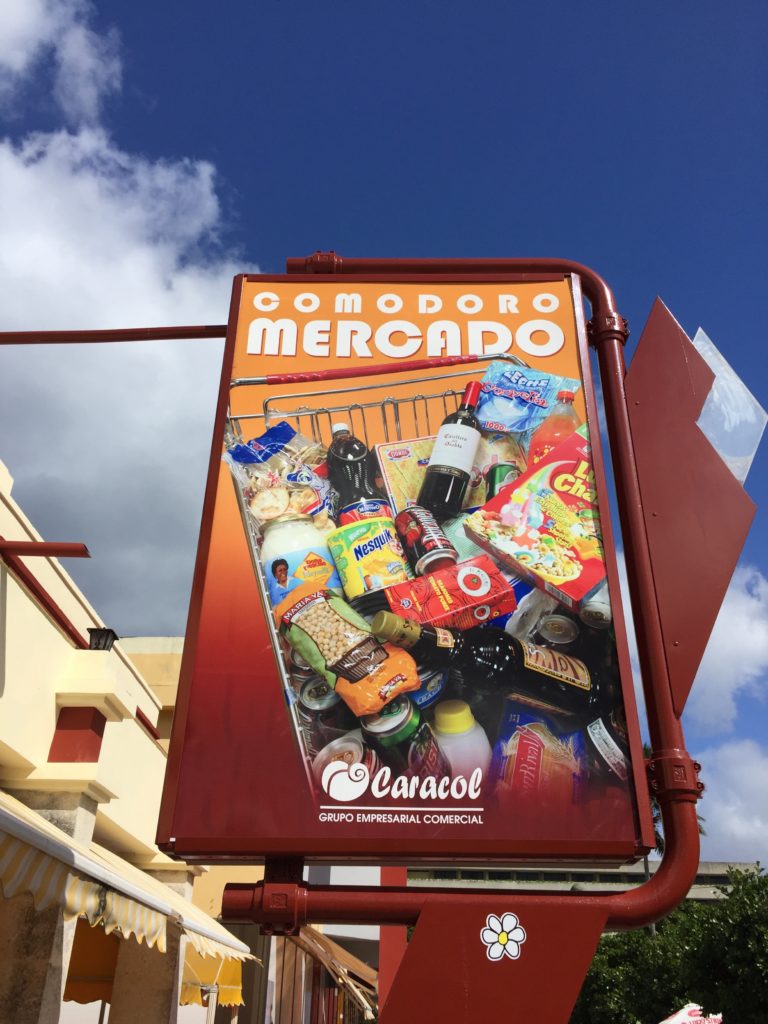 a sign with a picture of food on it