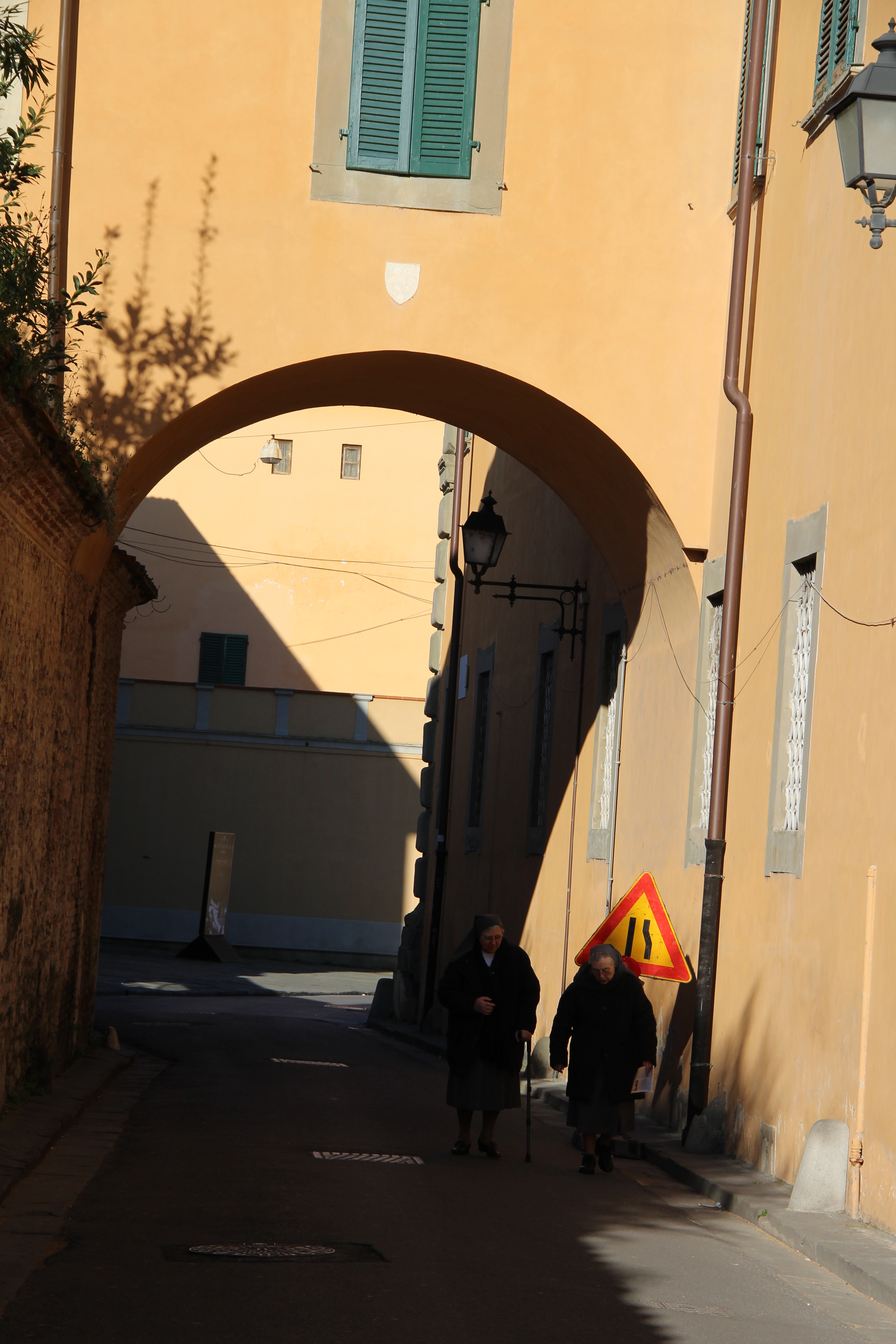 Old women in the streets of Pisa