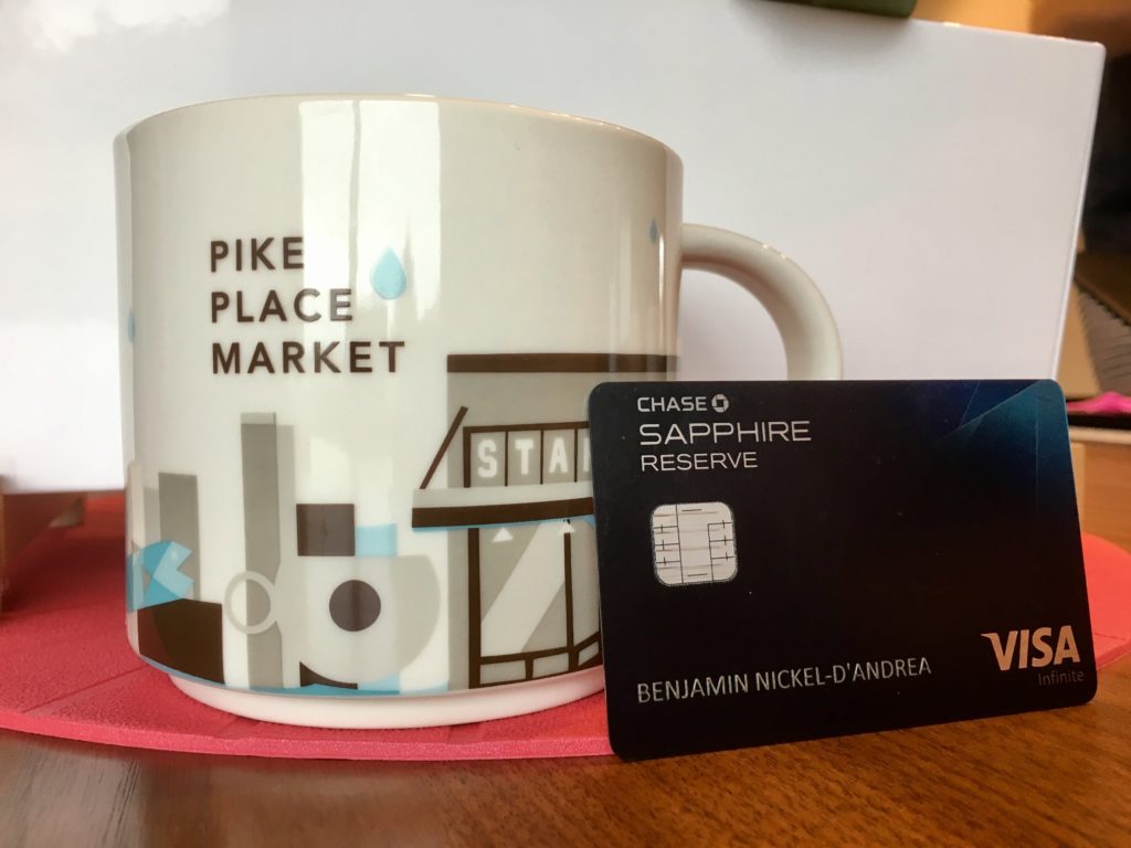 a coffee cup and a credit card