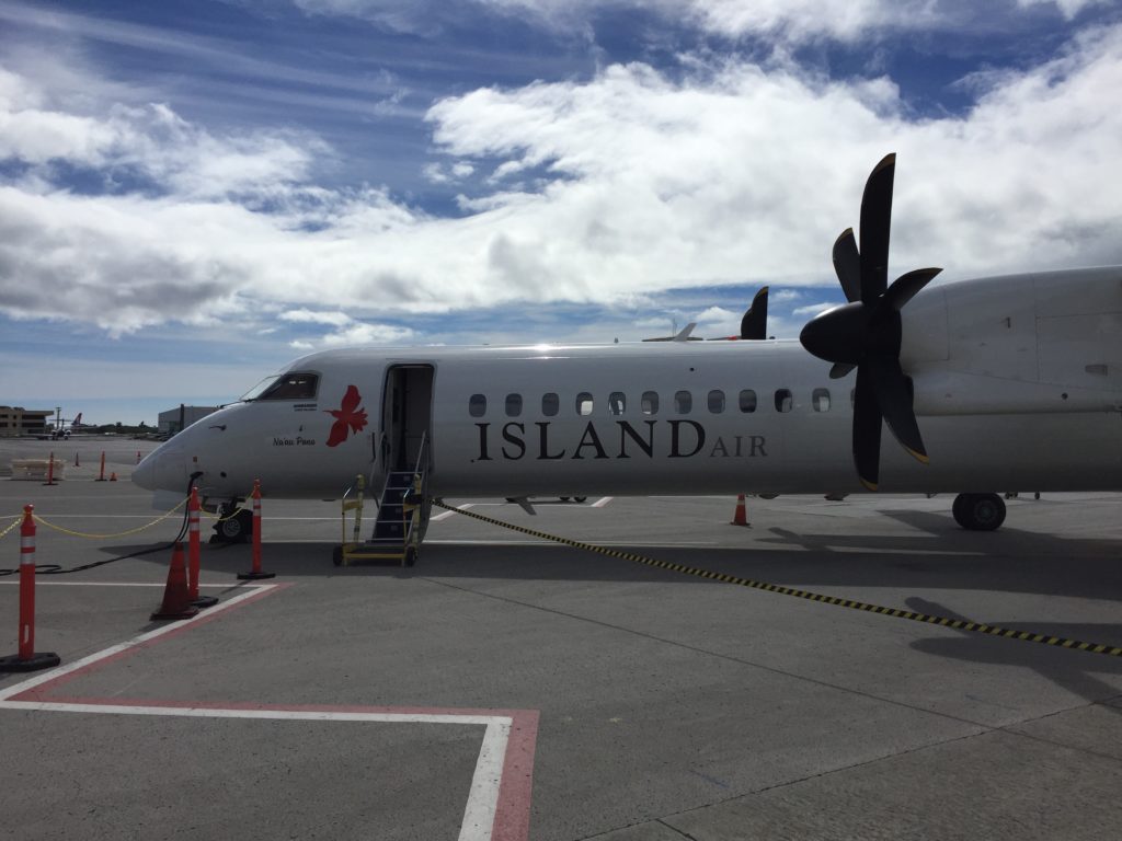 a plane with propeller on the ground