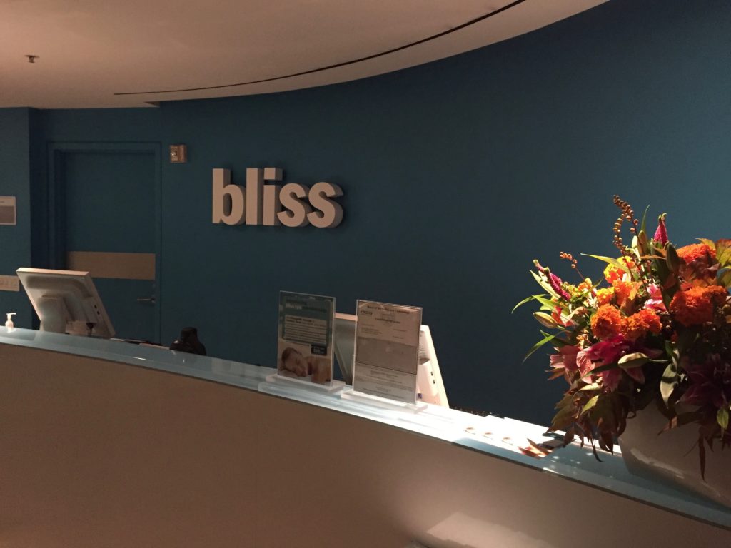 a reception desk with flowers on it