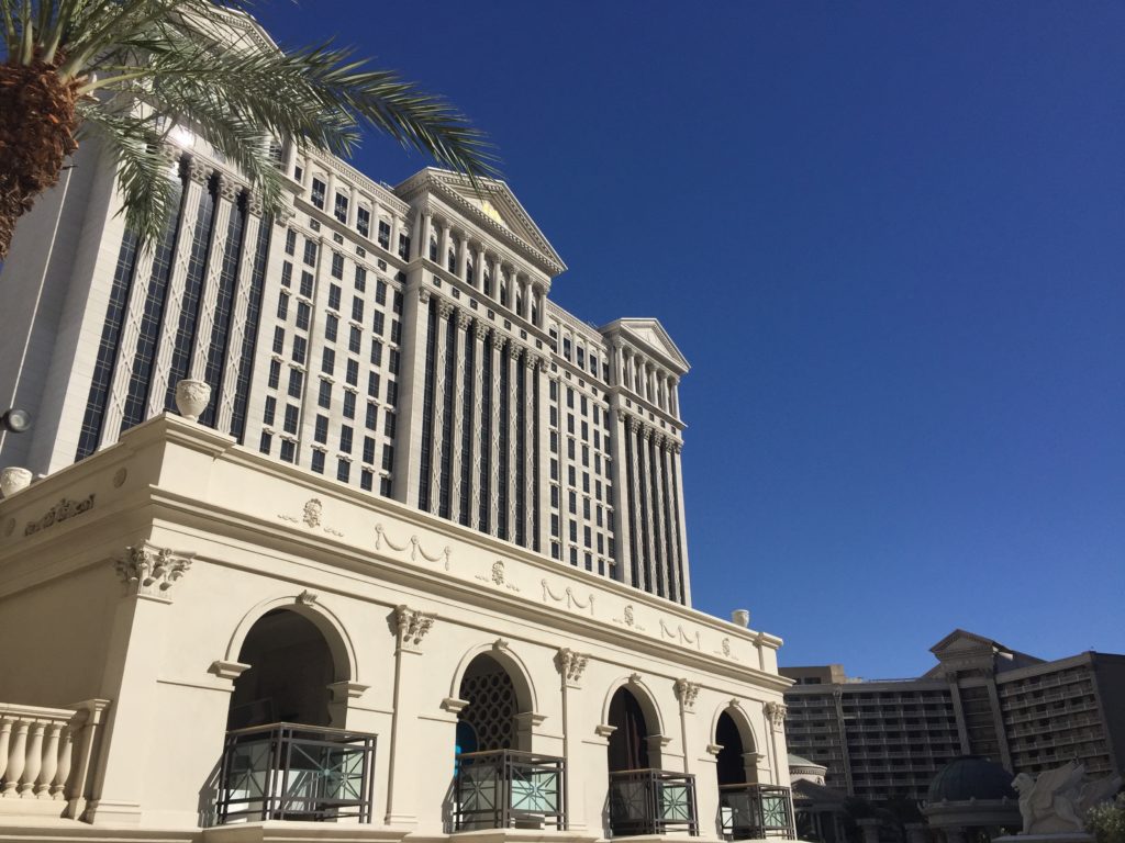 a building with palm trees