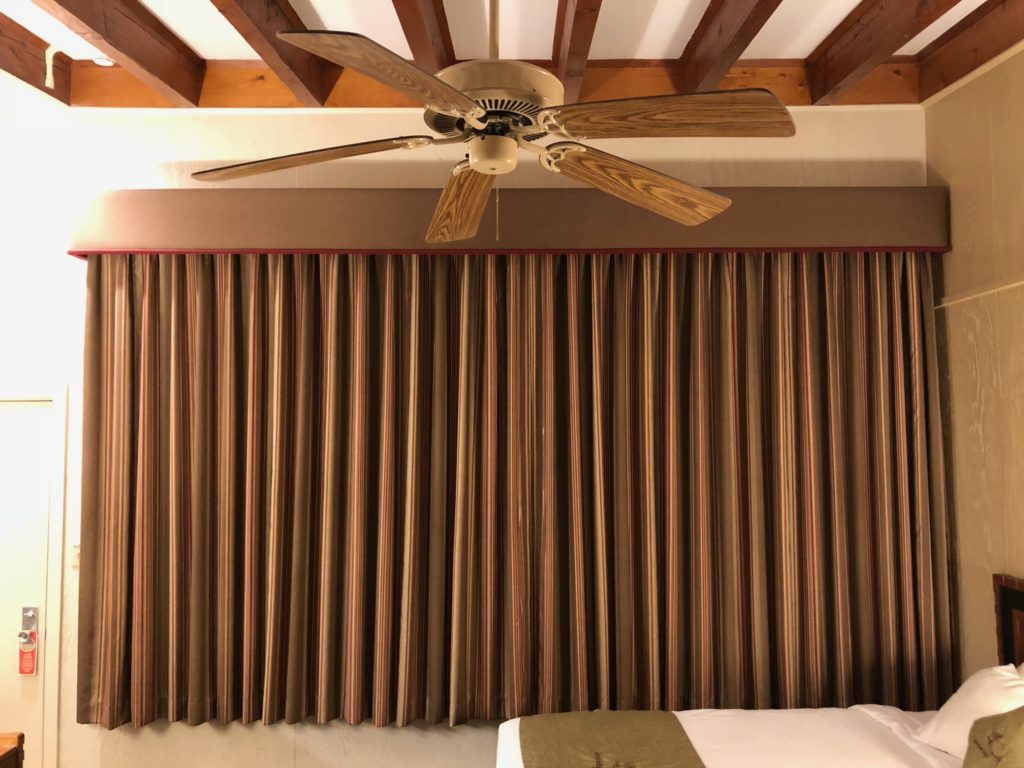 a ceiling fan in a room