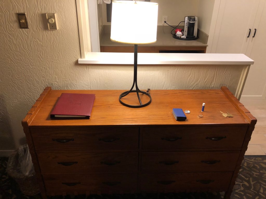 a lamp on a dresser