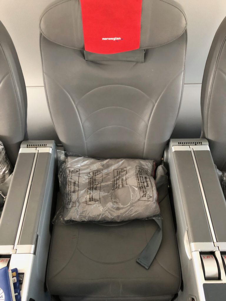 a seat with a bag inside