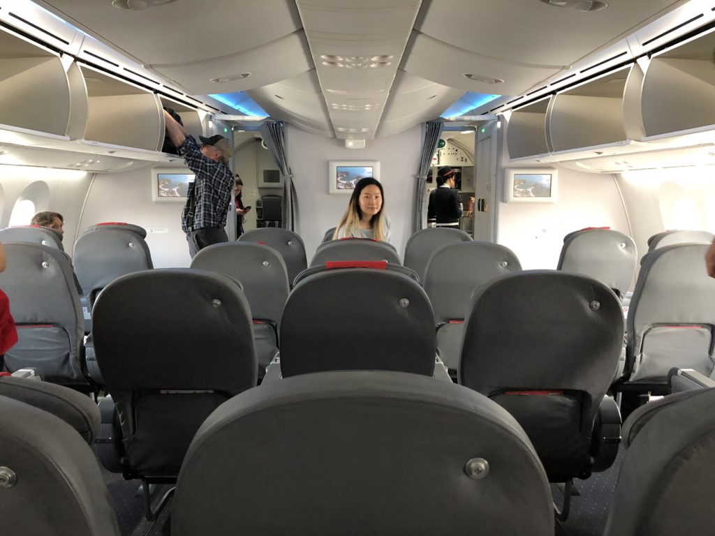 a woman sitting in an airplane