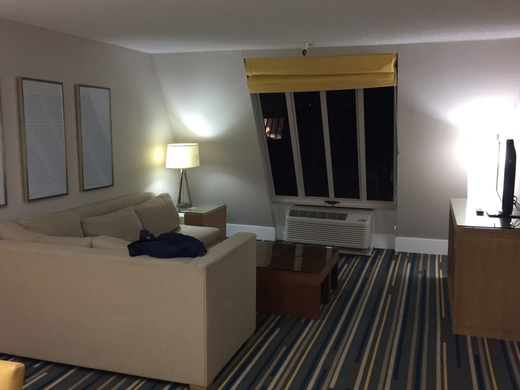 a room with a couch and a window