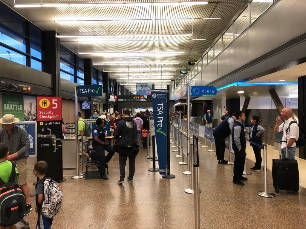 people standing in a terminal