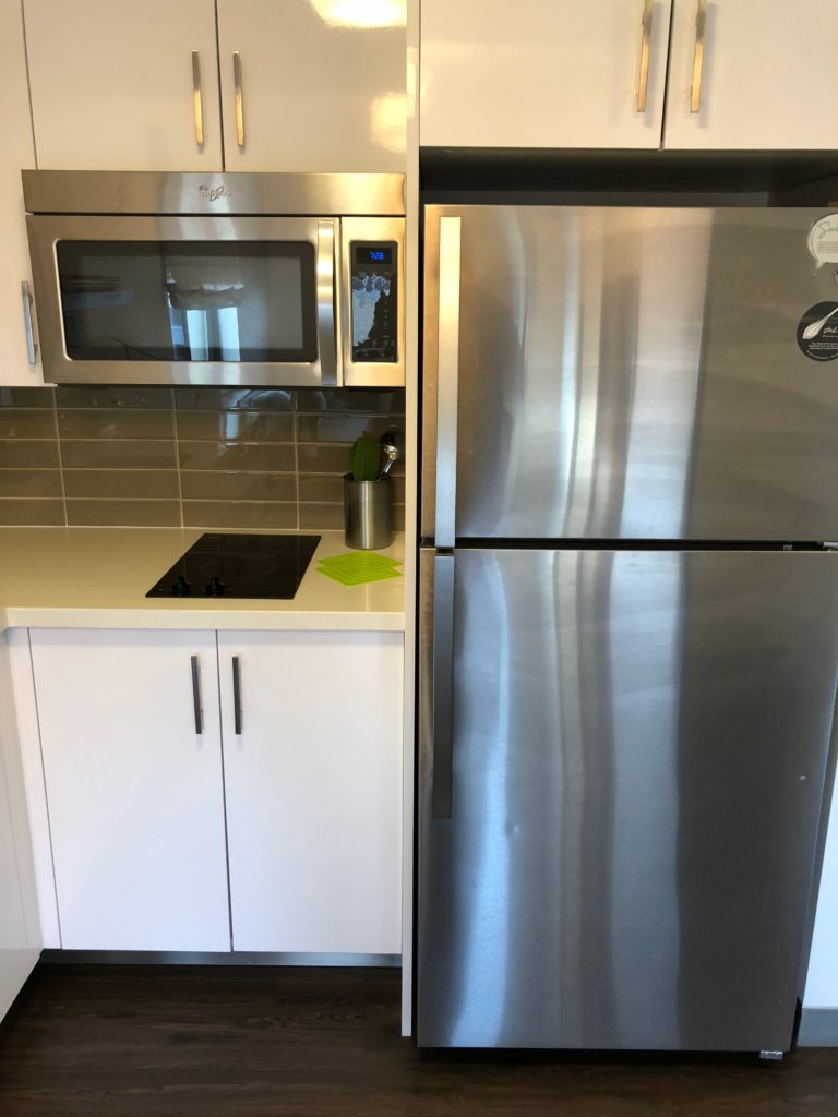 a kitchen with stainless steel appliances