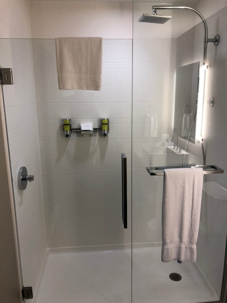 a shower with a glass door