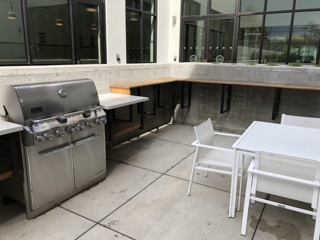 a grill and table outside