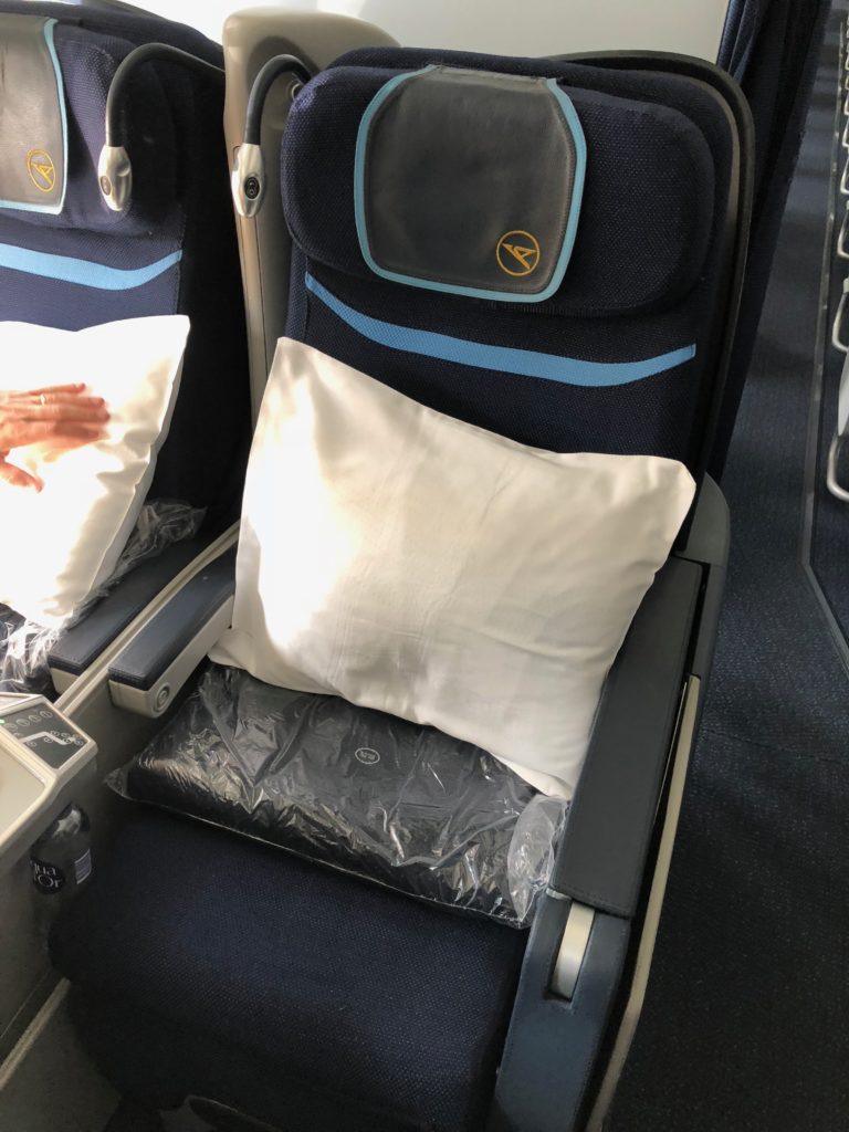 a seat with a pillow on it