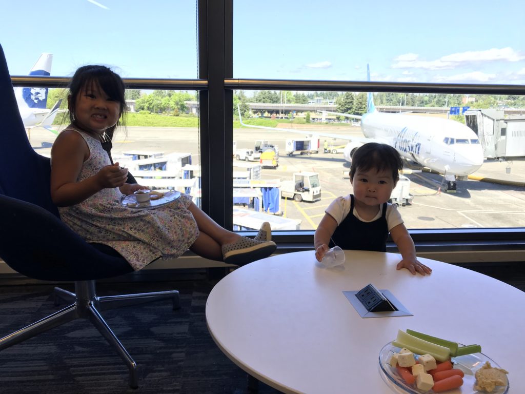 two children sitting at a table