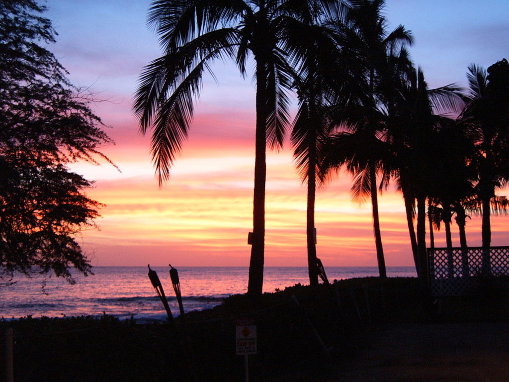 a sunset over a beach