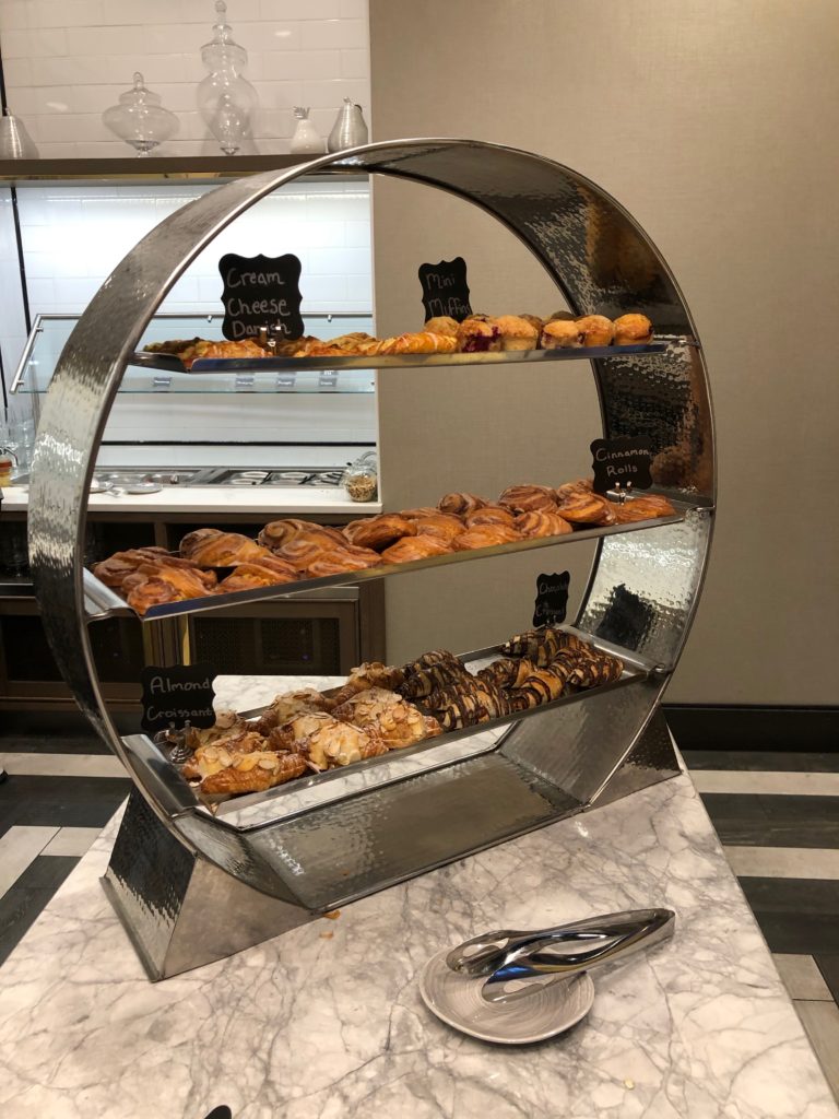 a display of pastries on a counter