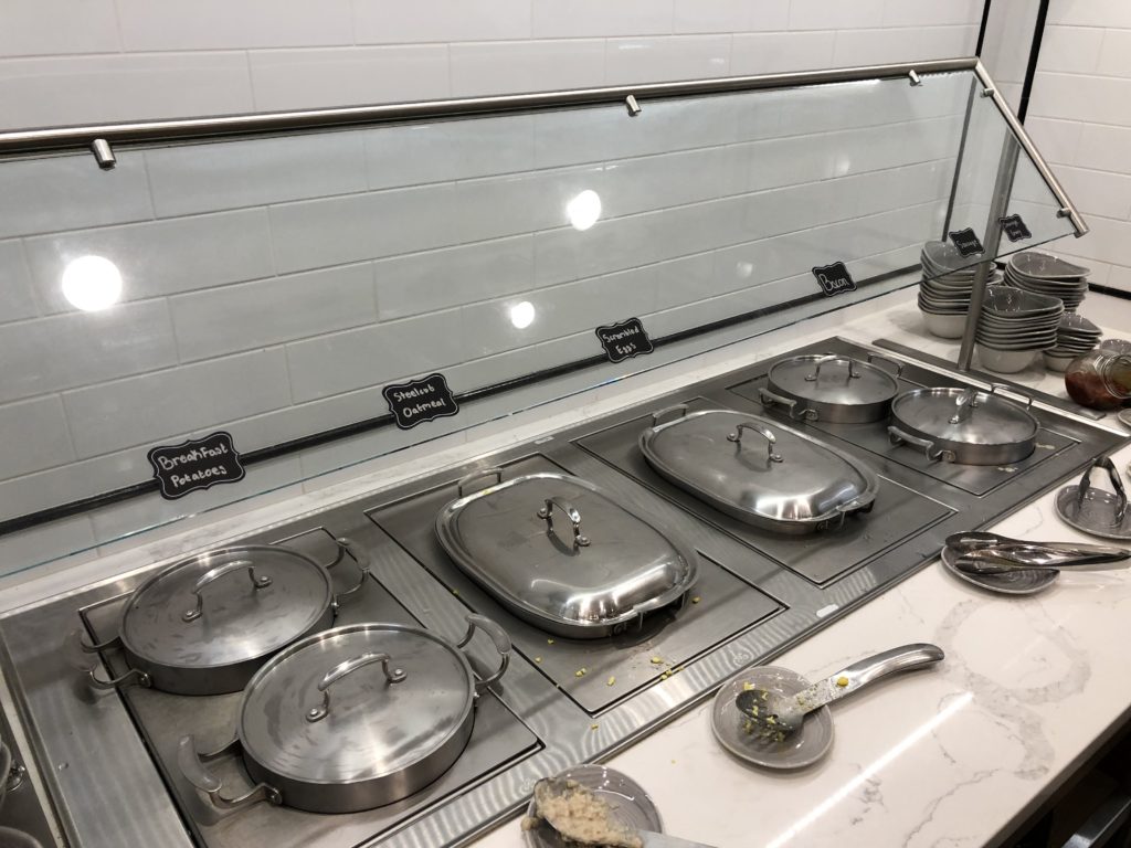 a group of metal containers on a counter