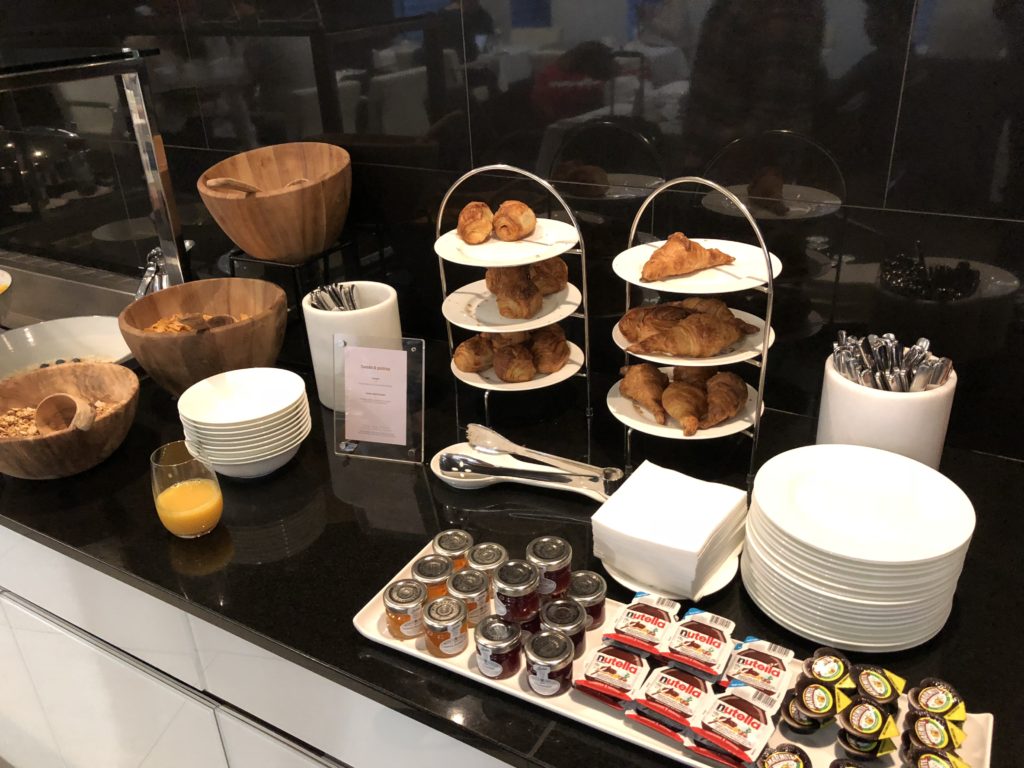 a buffet table with food and drinks