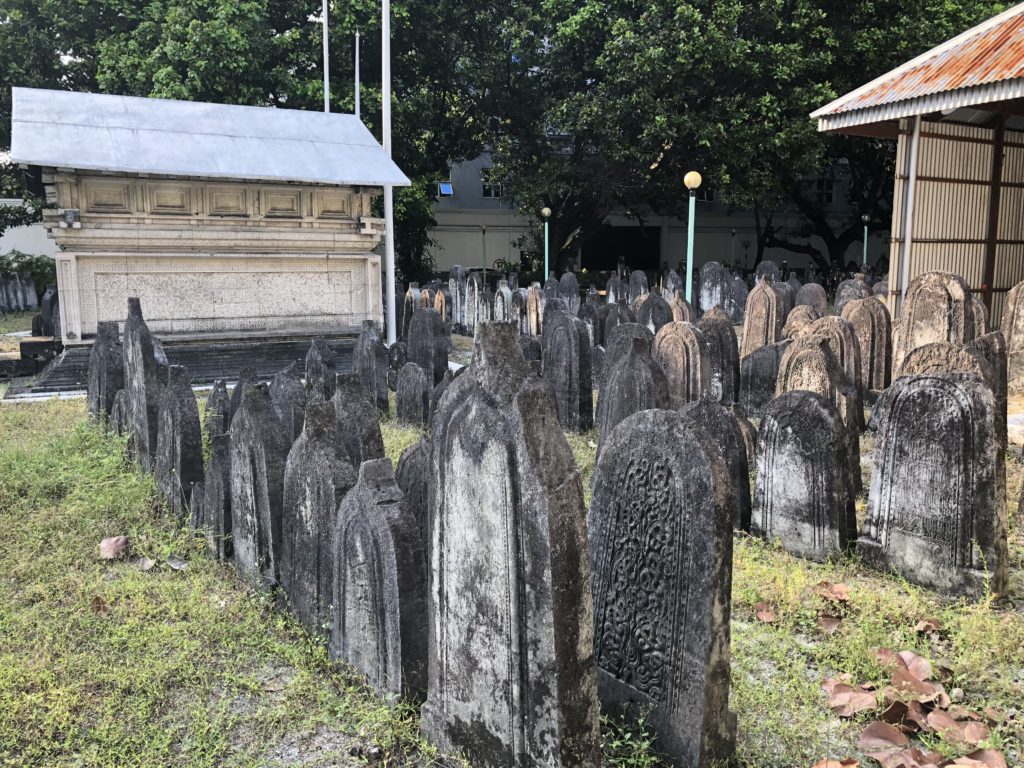 a cemetery with many gravestones