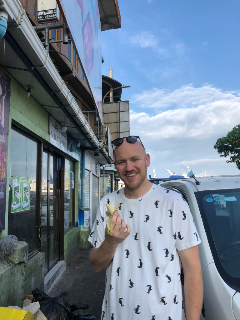 a man holding a banana