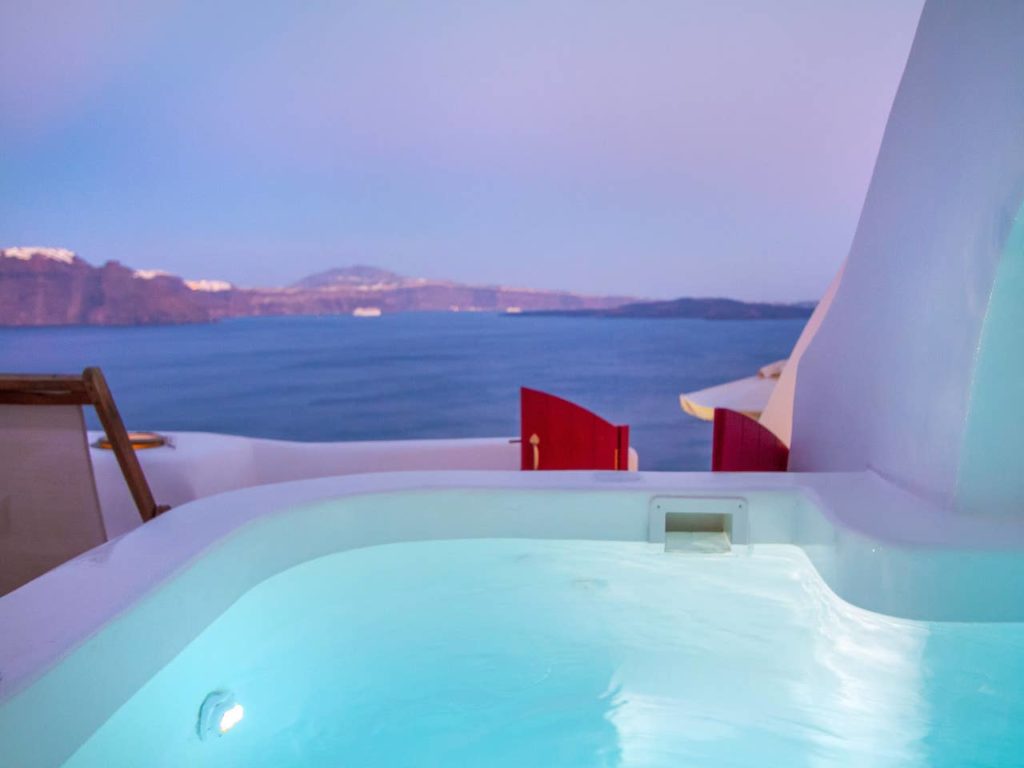 a hot tub overlooking the ocean