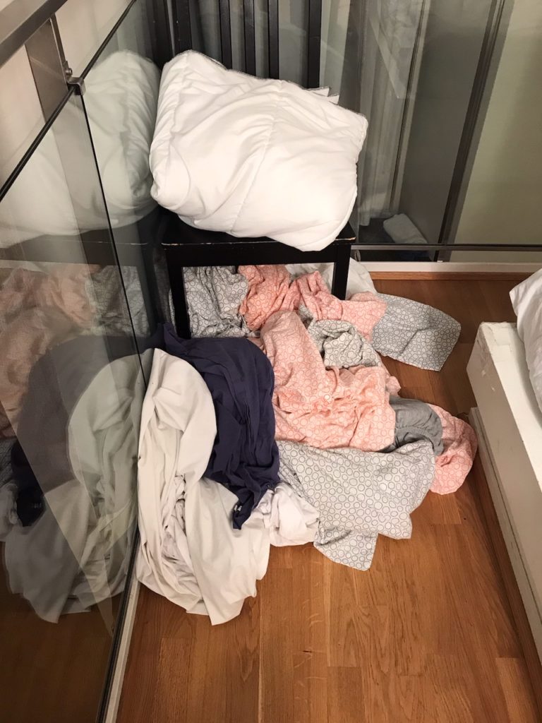 a pile of clothes on the floor