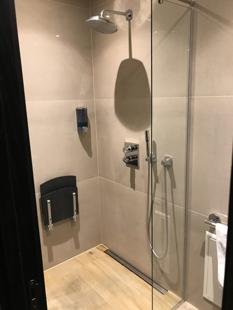 a shower with a glass door