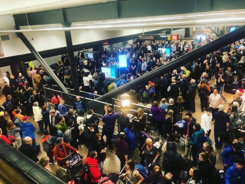 a group of people in a terminal