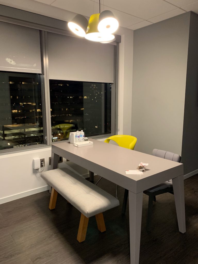 a table and chairs in a room