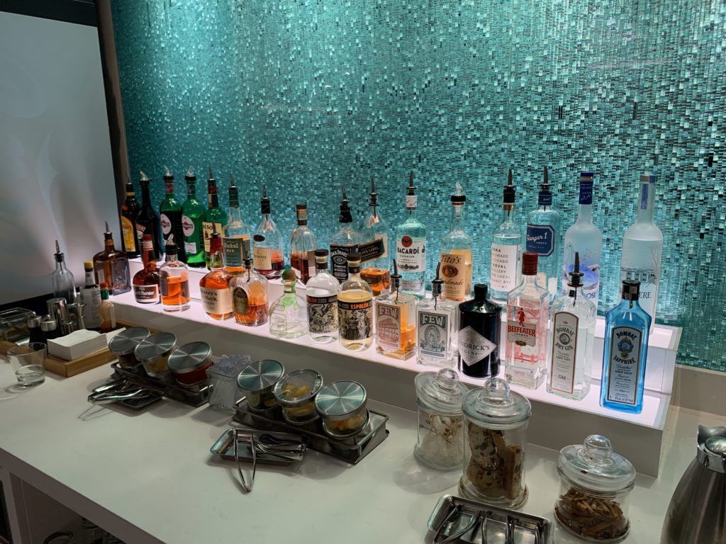 a bar with many bottles of alcohol