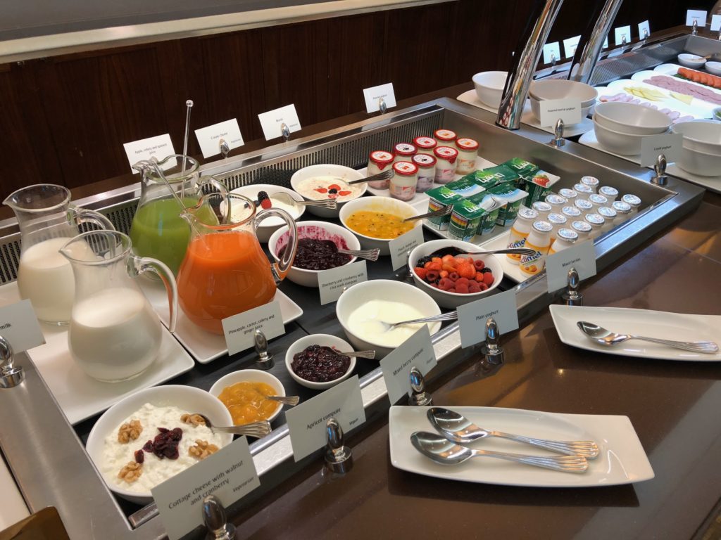 a buffet with different foods on it