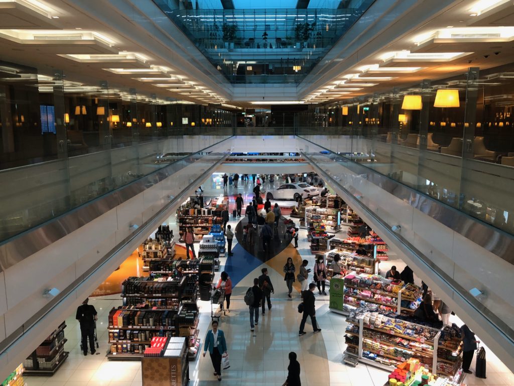 a large mall with many people walking around
