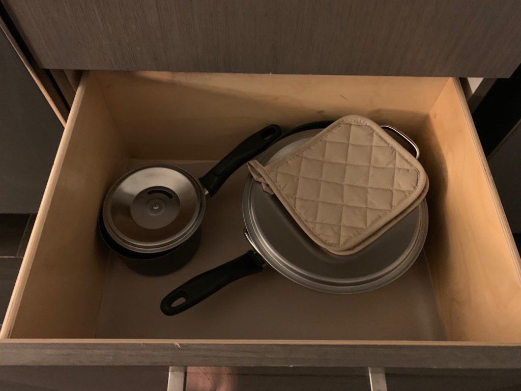 a pot and pan in a drawer