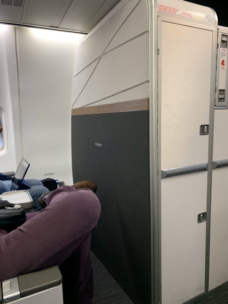 a person sleeping on a plane