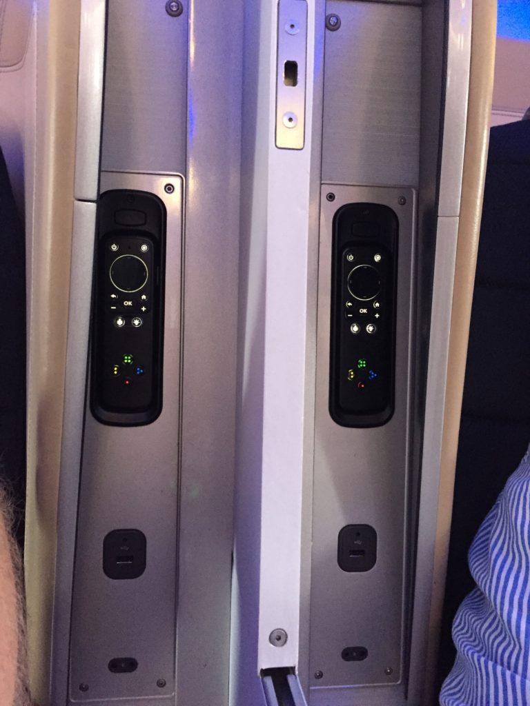 a pair of rectangular objects with buttons and lights
