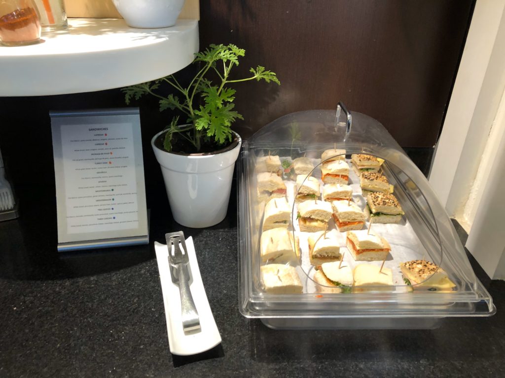 a tray of sandwiches in a plastic container