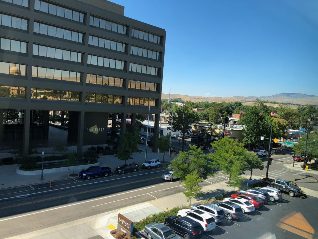 a building with cars parked in front of it