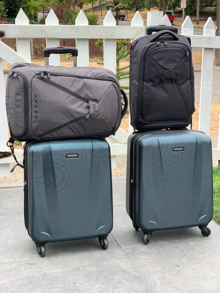 a group of luggage on a porch