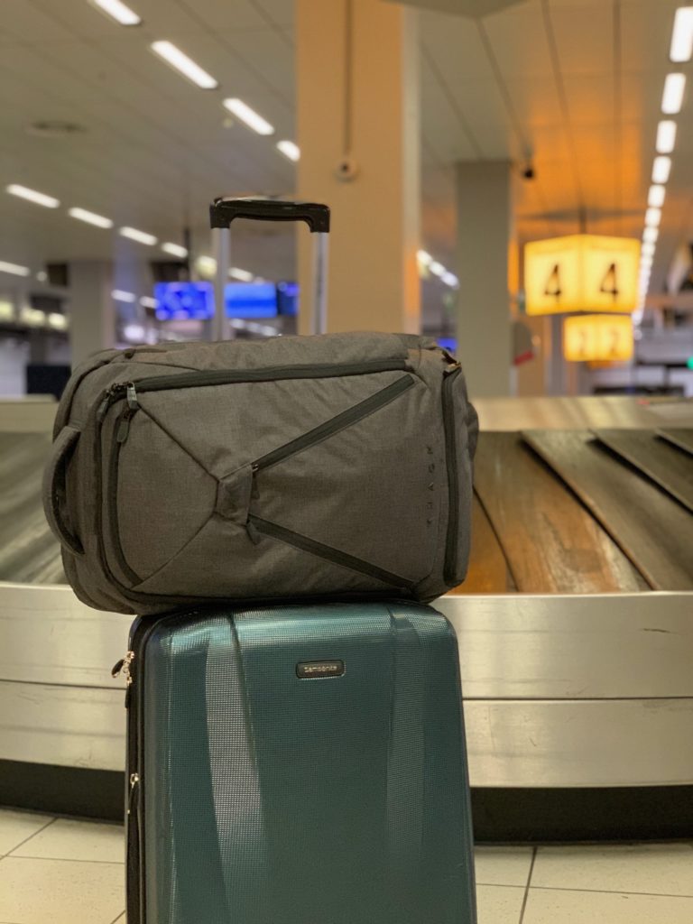 luggage on top of luggage at an airport