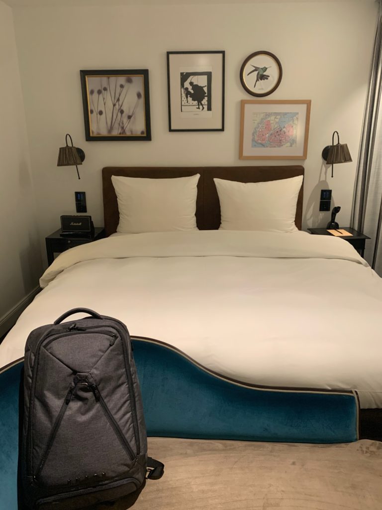 a backpack on a bed