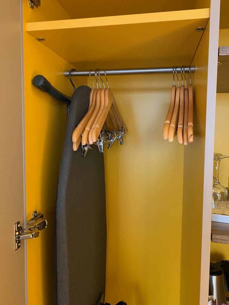a ironing board on a rack
