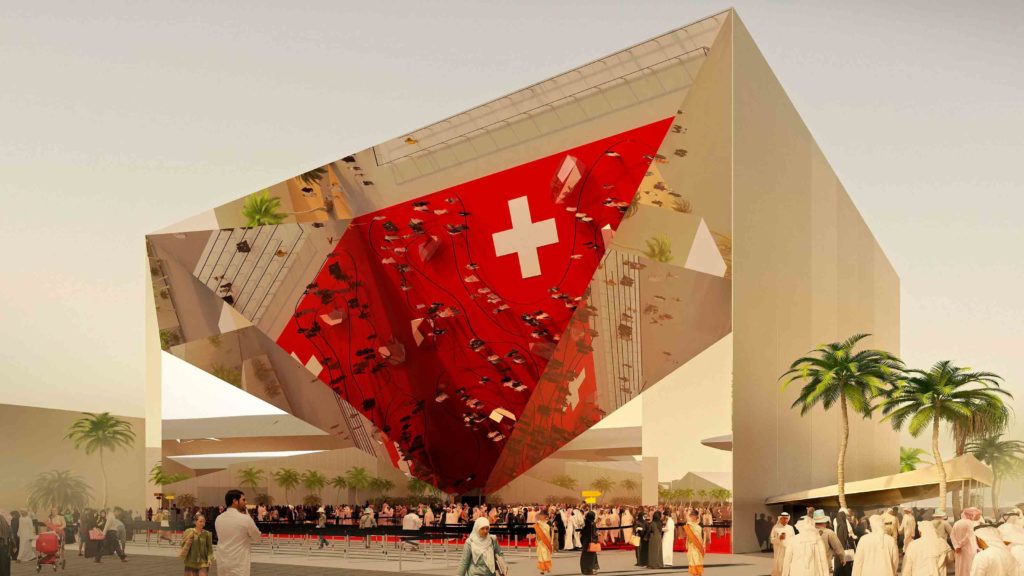 a large triangular structure with a red and white design
