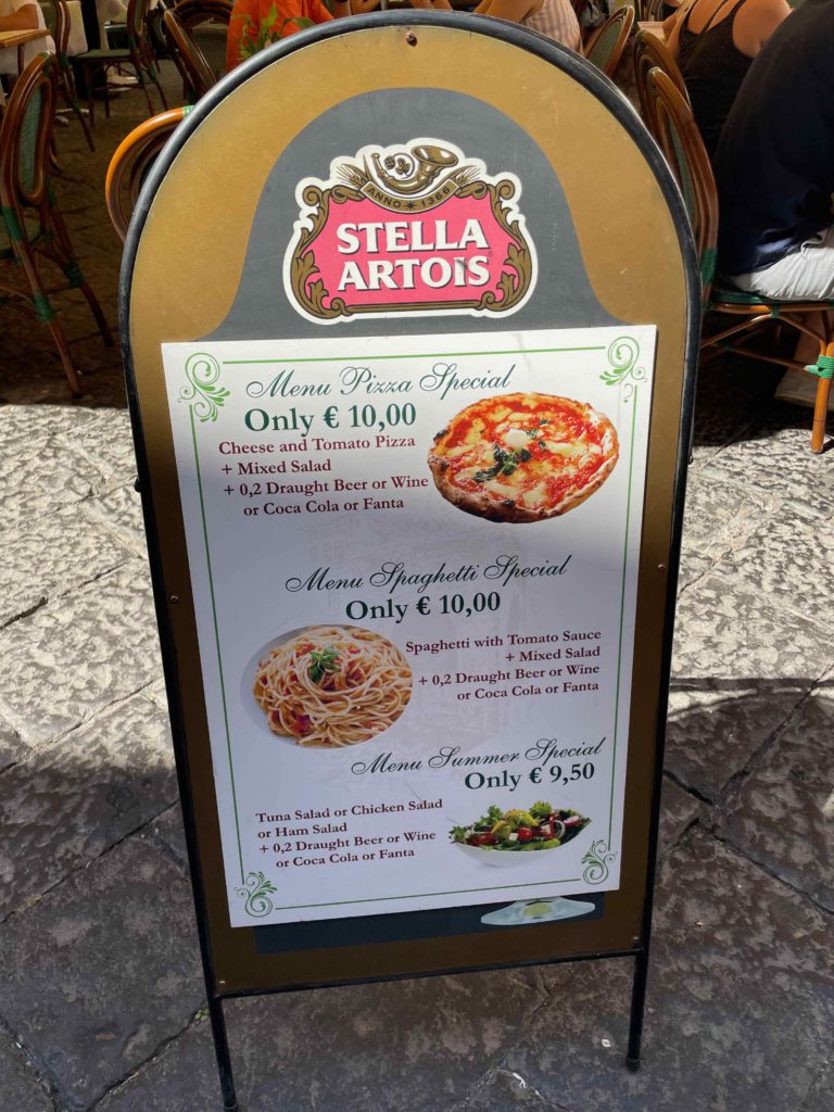 a sign with a menu on it