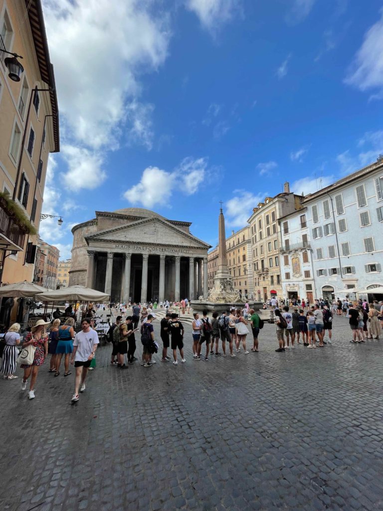 a group of people in a plaza